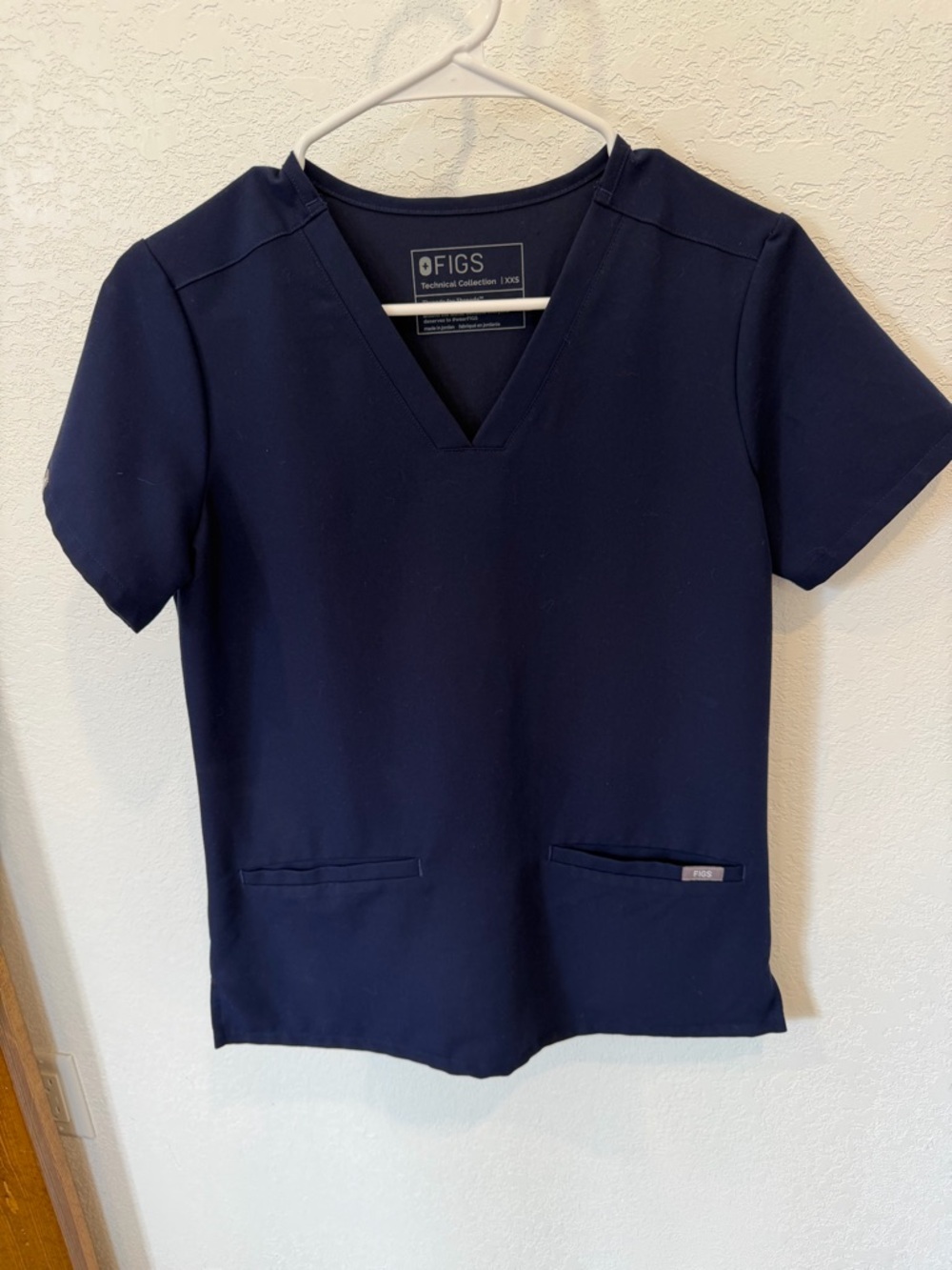 FIGS Women's Casma top in navy blue